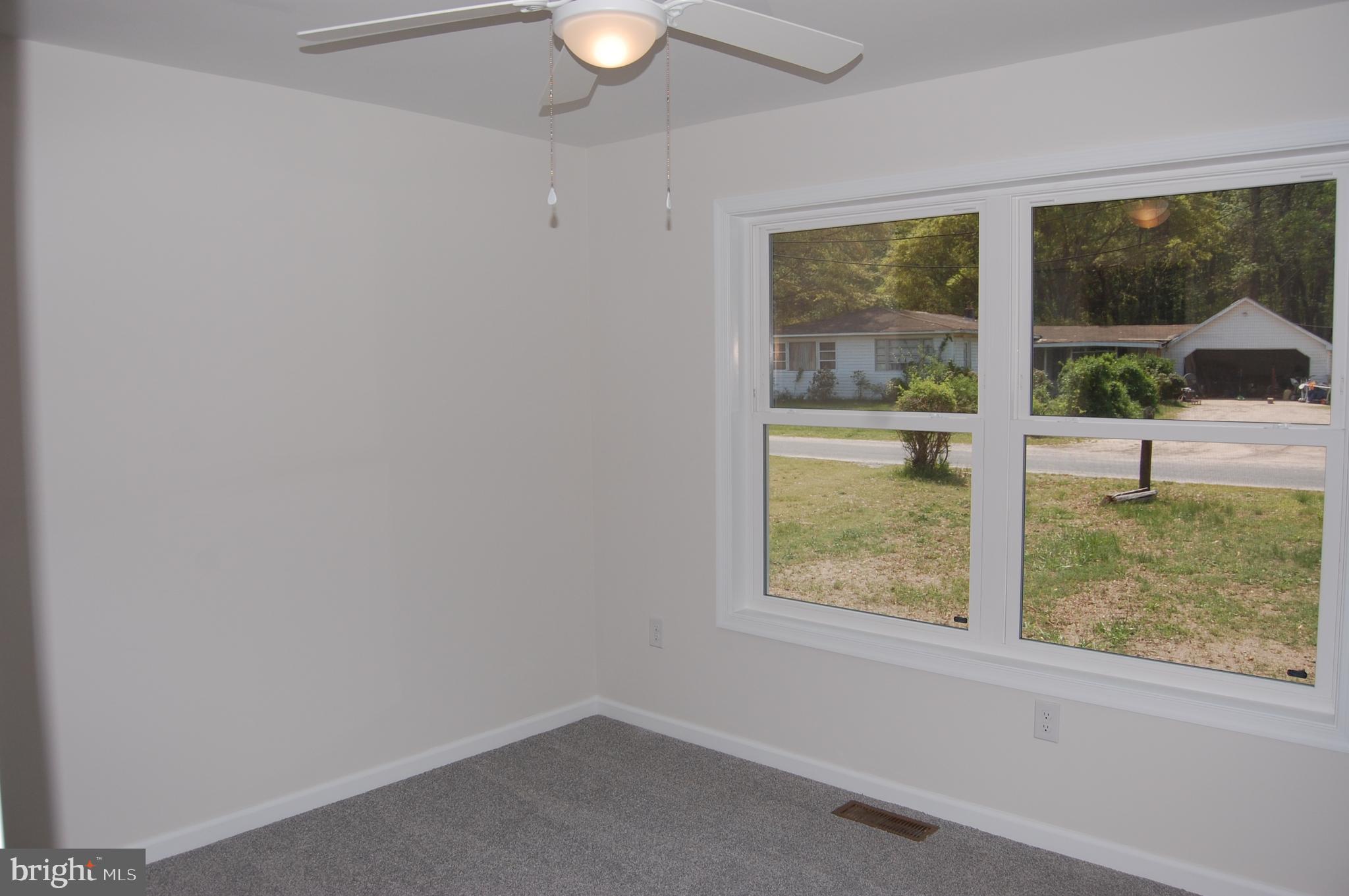 11511 Old School Road Mardela Springs, MD 21837 - Photo 17 of 34 a view of an empty room with a window