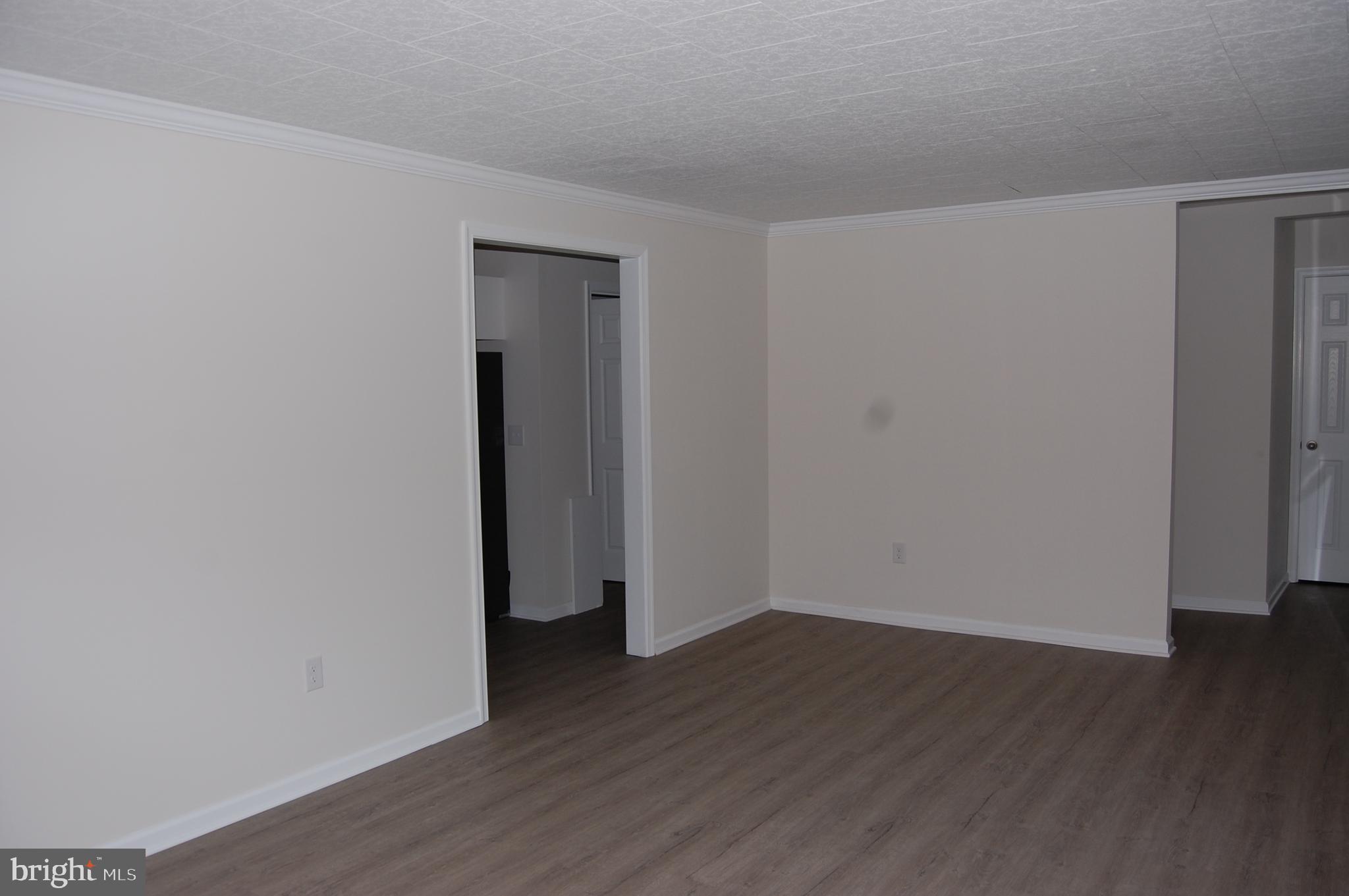 11511 Old School Road Mardela Springs, MD 21837 - Photo 18 of 34 a view of a room with wooden floor