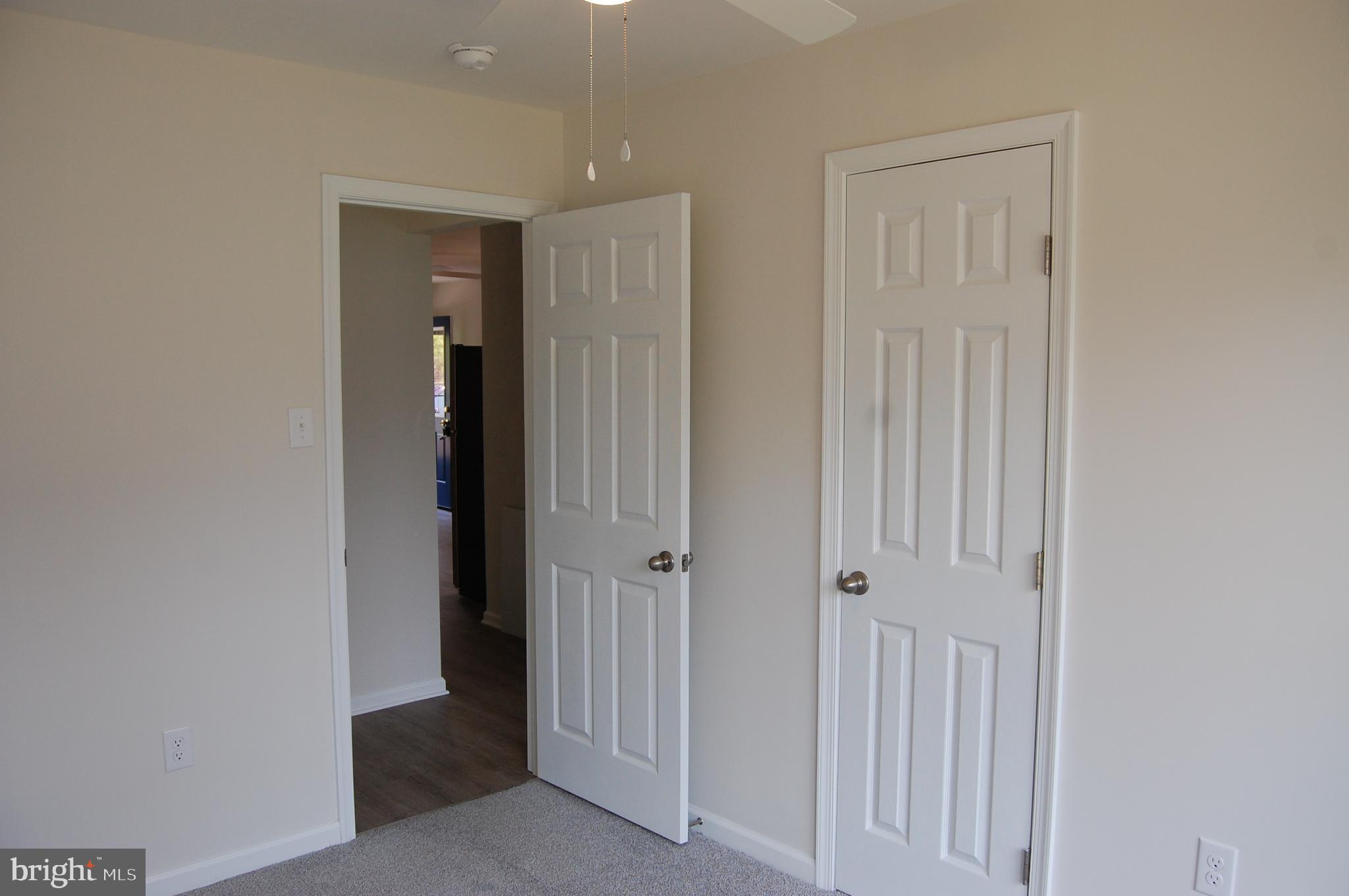 11511 Old School Road Mardela Springs, MD 21837 - Photo 26 of 34 an empty room with closet and a bathroom