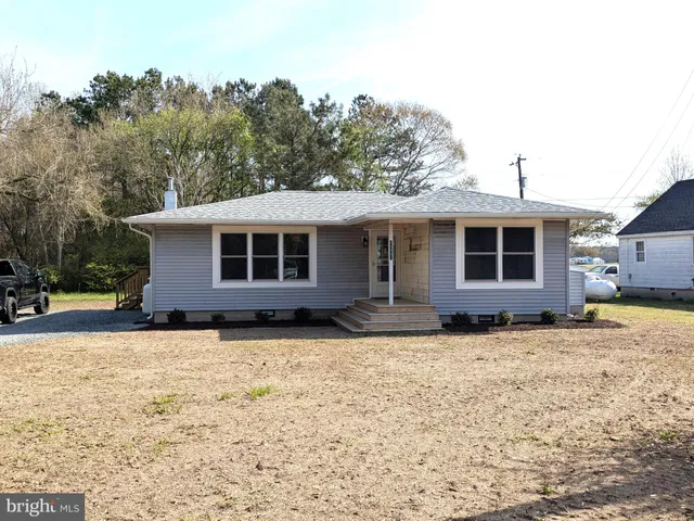 a house view with a outdoor space
