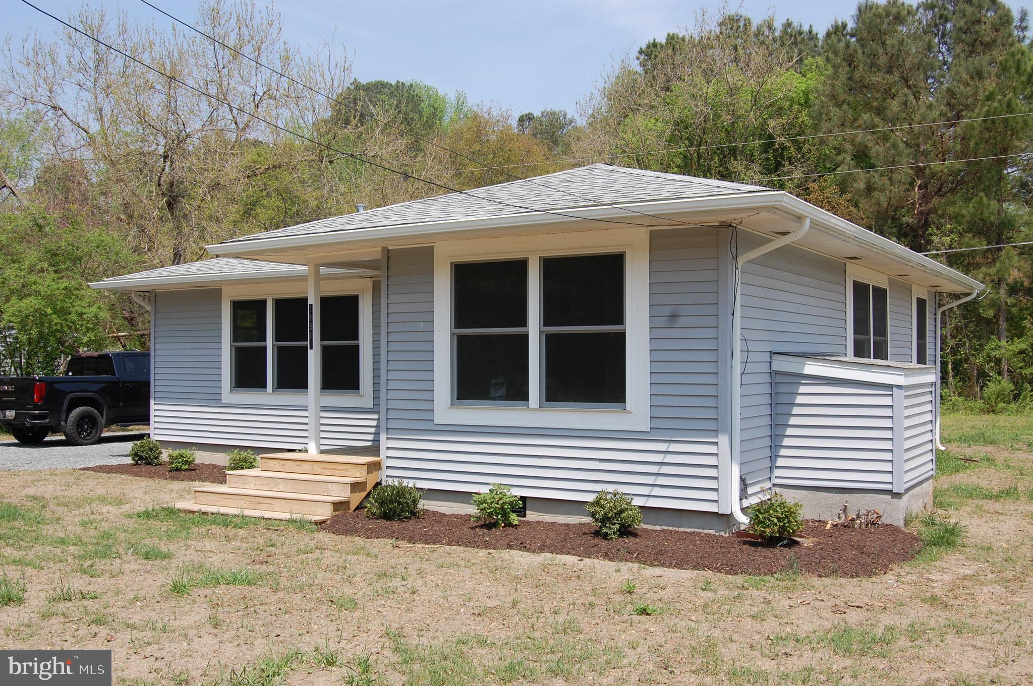 11511 Old School Road Mardela Springs, MD 21837 - Photo 4 of 34 a front view of a house with garden