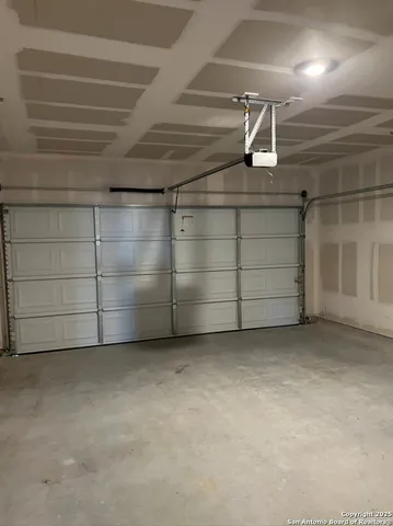 a house that has a large window in front of it