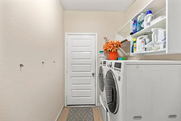 a bathroom with a sink a mirror and a toilet