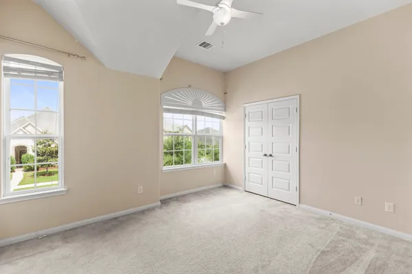 an empty room with fan