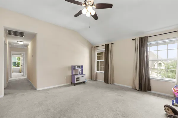 a backyard of a house with lots of green space