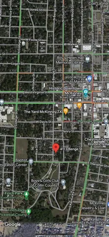 a sign that is next to a yard