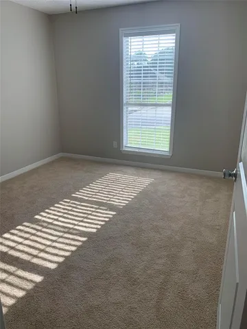 an empty room with a window
