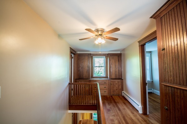 44 Bridge Street Warren, RI 02885 - Photo 15 of 30 wooden floor in an empty room with a window