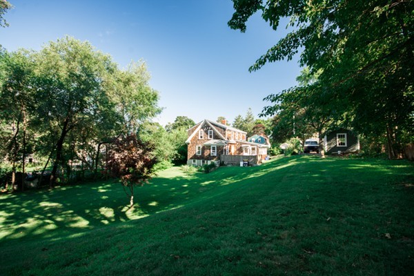44 Bridge Street Warren, RI 02885 - Photo 5 of 30 a front view of a house with garden