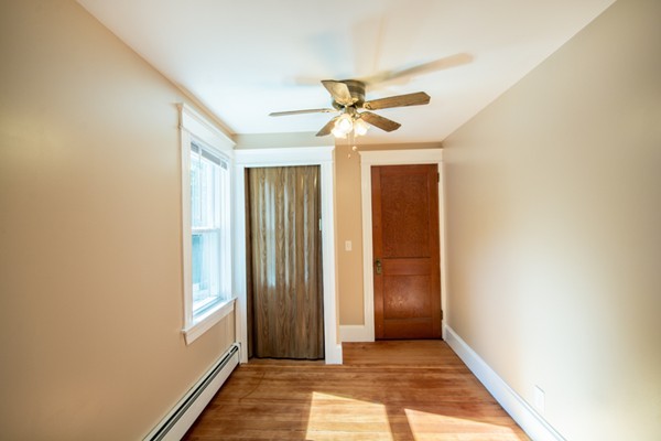 44 Bridge Street Warren, RI 02885 - Photo 9 of 30 a view of hallway with window