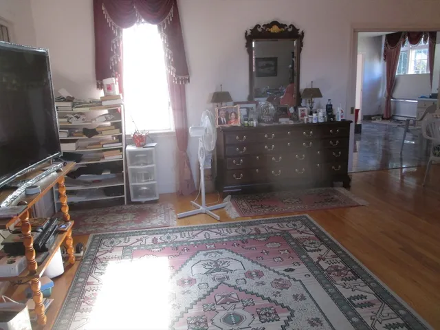 a view of living room and dining room