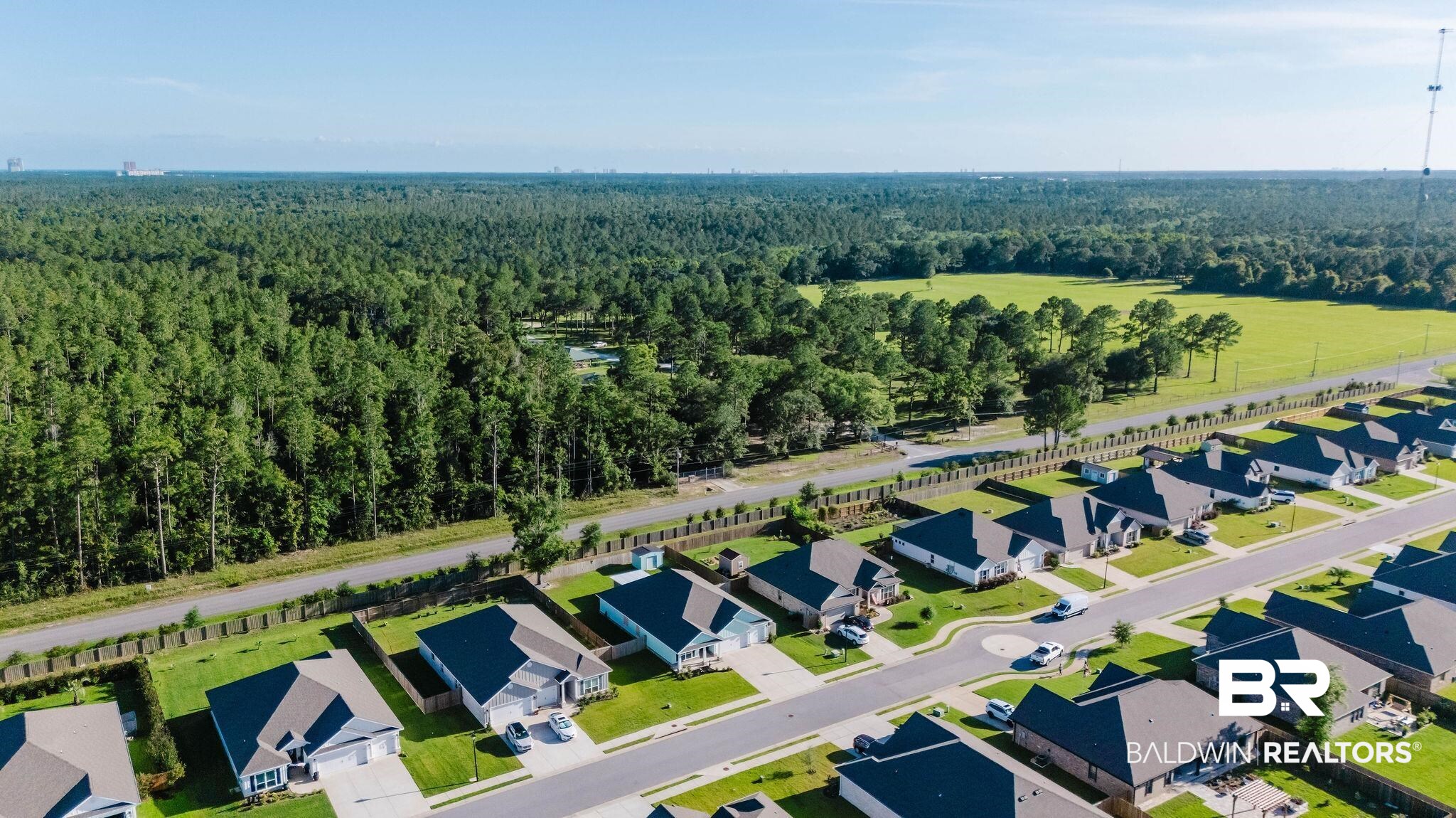 7872 Calverton Street Foley, AL 36535 - Photo 74 of 76 Aerial perspective showcasing a residential community with uniform architectural styles