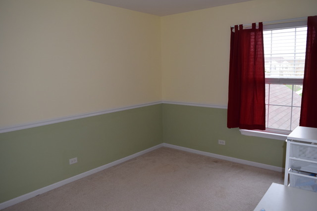 2370 Georgetown Circle, Unit 2370 Aurora, IL 60503 - Photo 17 of 21 a room with a window and a fan