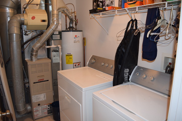 2370 Georgetown Circle, Unit 2370 Aurora, IL 60503 - Photo 18 of 21 a utility room with dryer and washer