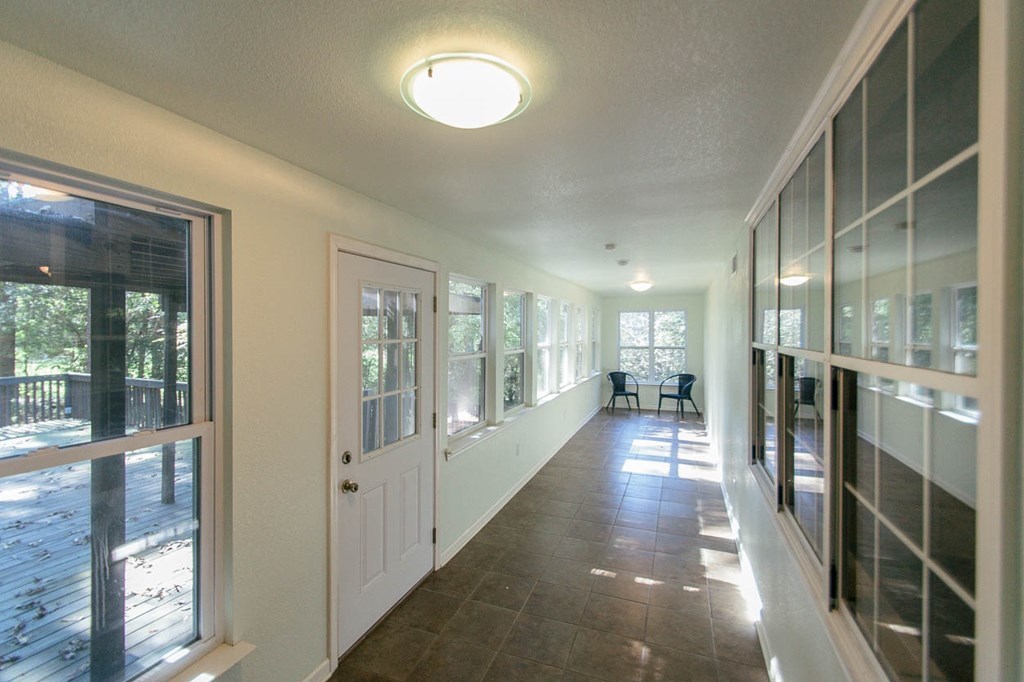 201 Red Oak Road Byron, GA 31008 - Photo 23 of 29 a view of a hallway with wooden floor windows and livingroom view