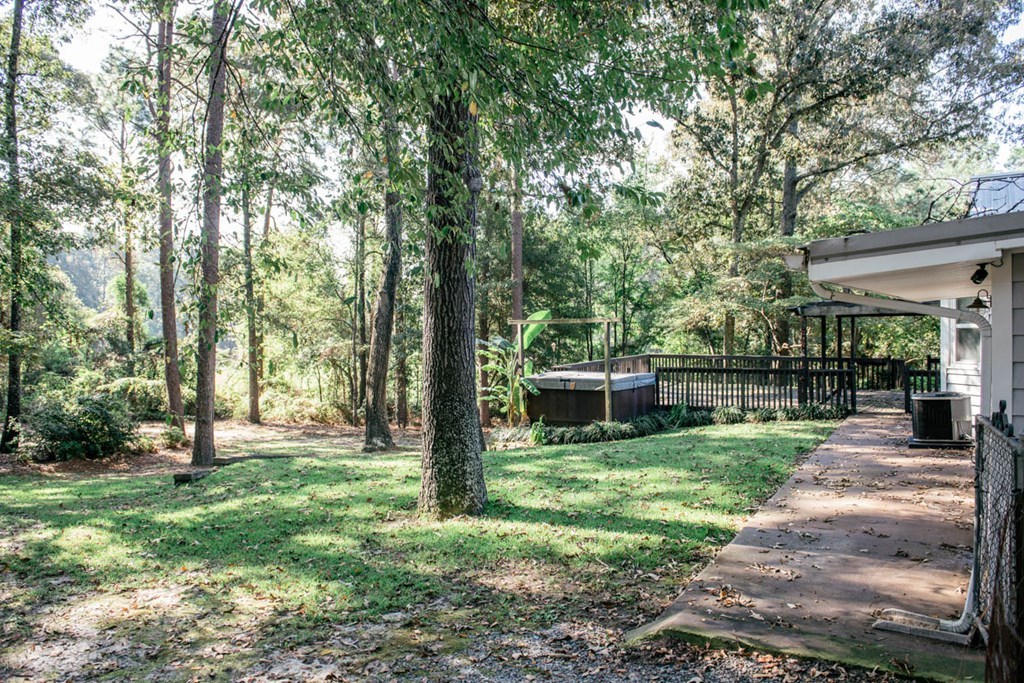 201 Red Oak Road Byron, GA 31008 - Photo 27 of 29 a view of a backyard with tree s