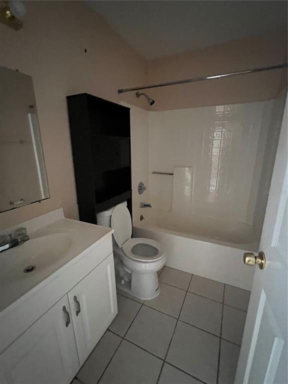 27082 Adams Street, Unit A Punta Gorda, FL 33983 - Photo 8 of 8 a bathroom with a toilet a sink and shower