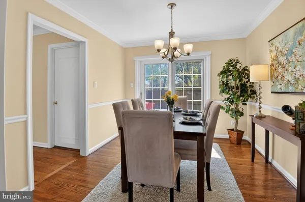 wooden floor with white walls