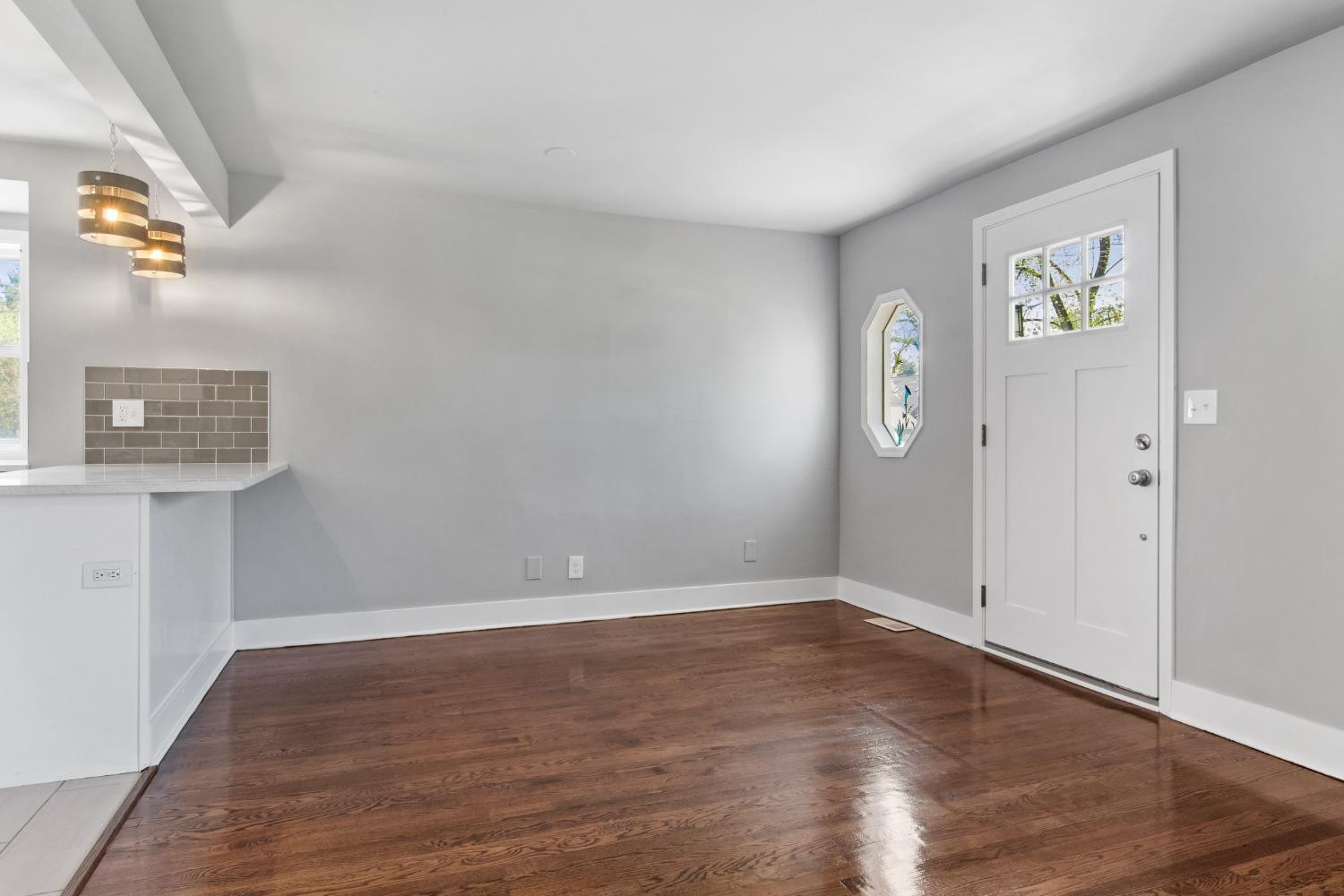4895 Cherry Street Griffith, IN 46319 - Photo 14 of 21 wooden floor in an empty room