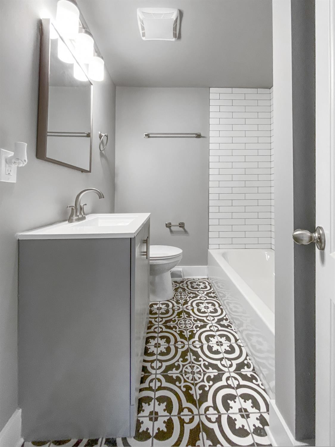 4895 Cherry Street Griffith, IN 46319 - Photo 18 of 21 a bathroom with a sink toilet and shower