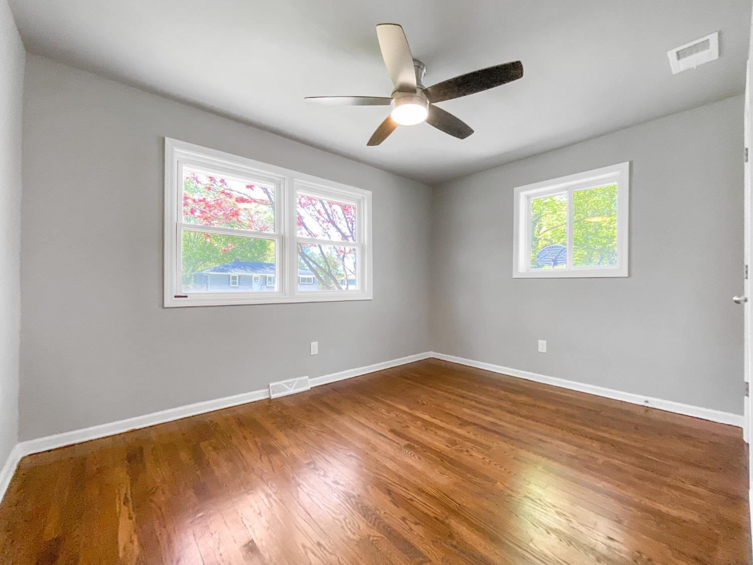 4895 Cherry Street Griffith, IN 46319 - Photo 20 of 21 a view of room with window and ceiling fan