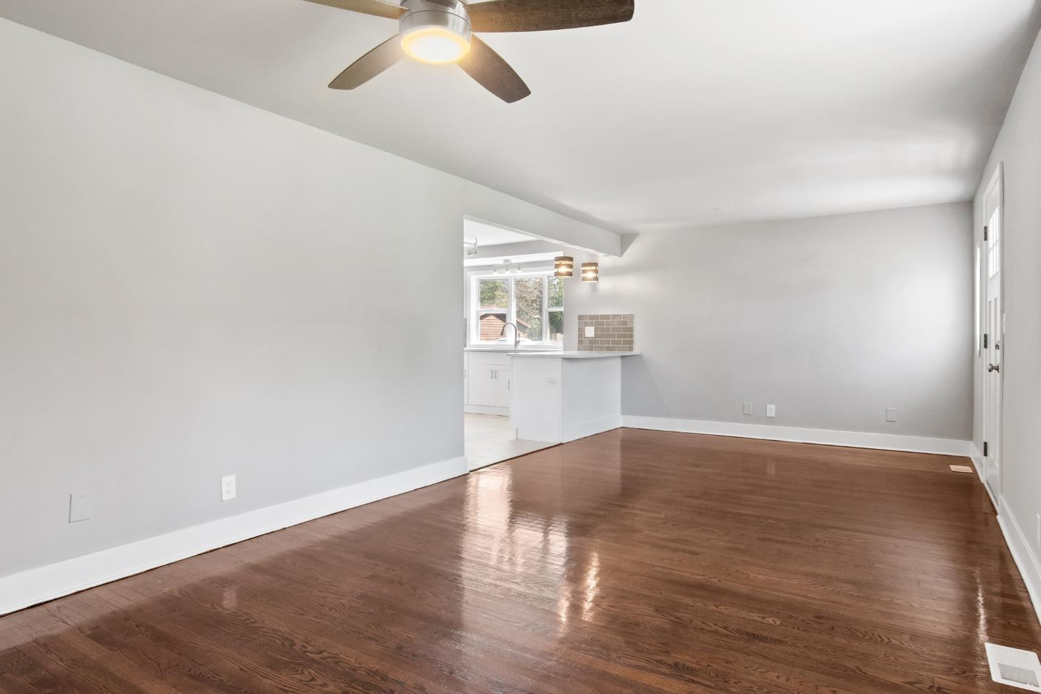 4895 Cherry Street Griffith, IN 46319 - Photo 5 of 21 wooden floor in an empty room