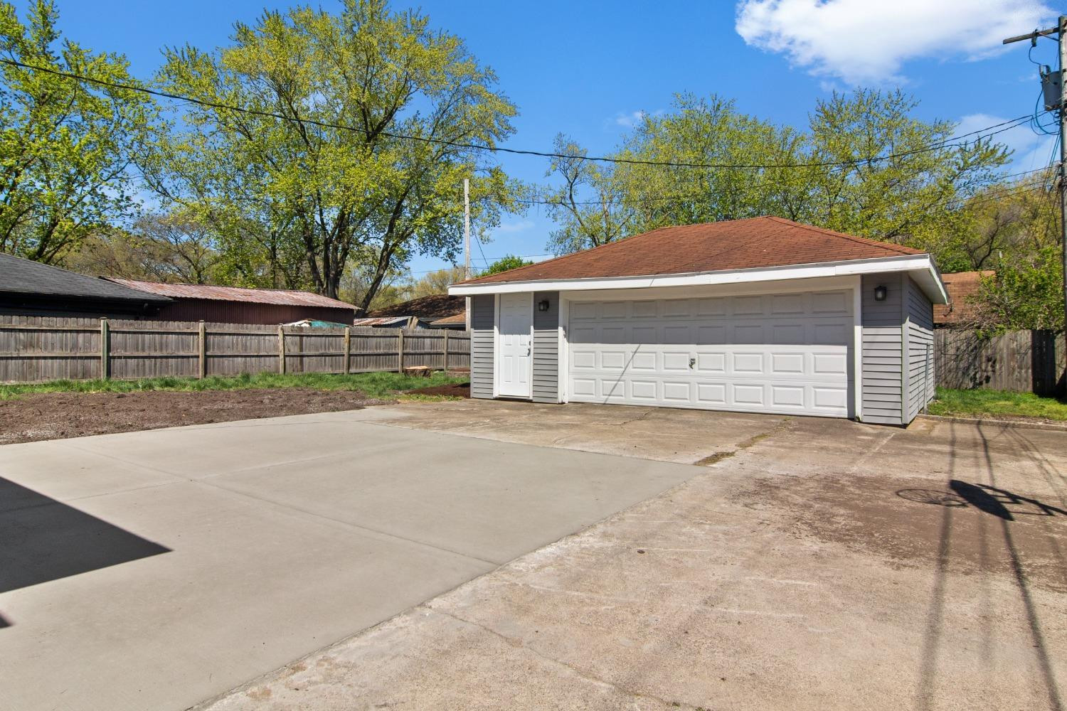 4895 Cherry Street Griffith, IN 46319 - Photo 7 of 21 a view of backyard of house with green space