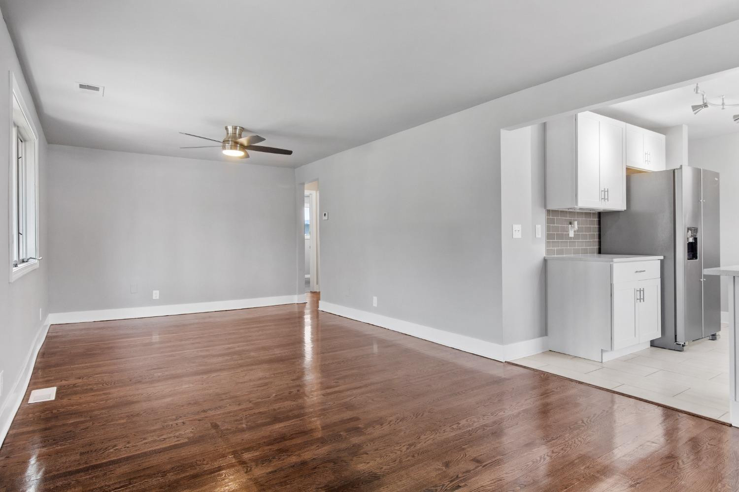 4895 Cherry Street Griffith, IN 46319 - Photo 9 of 21 a view of a kitchen with a sink and a refrigerator