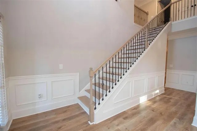 a view of entryway with wooden floor