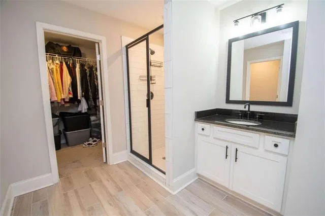 a view of a kitchen from a hallway