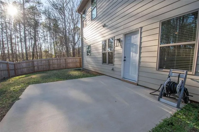 a view of backyard with cabin