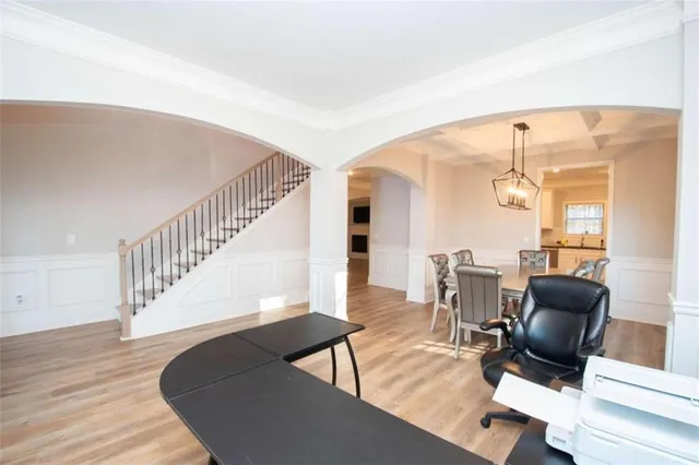 a view of a livingroom with furniture and a window