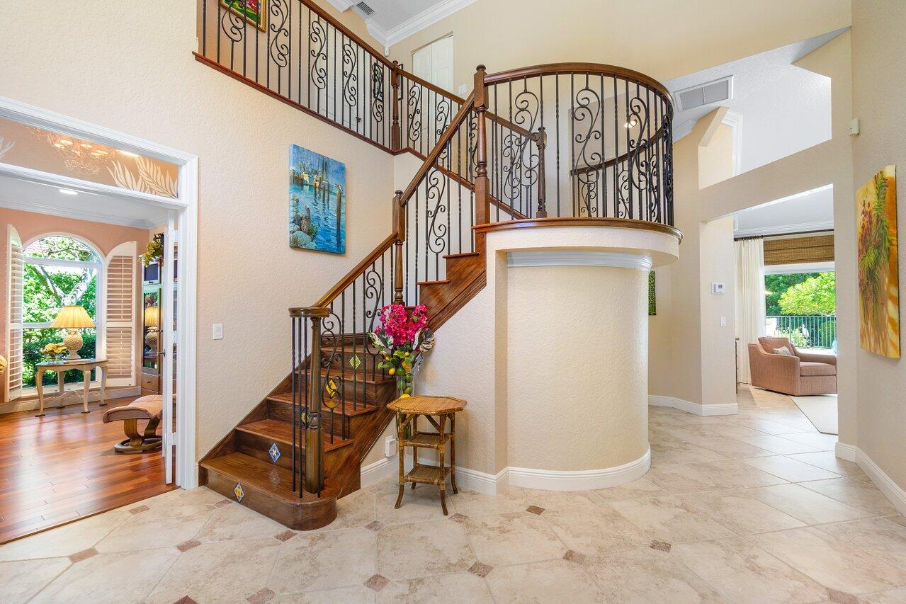 2680 Devon Court Delray Beach, FL 33445 - Photo 6 of 32 Impressive staircase upon entering