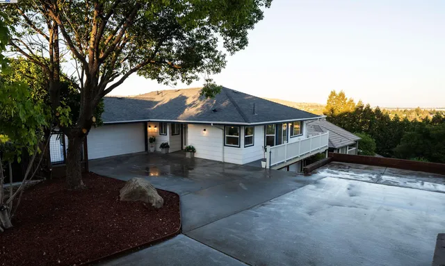 a front view of a house with garage