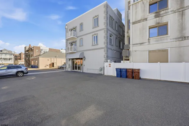 a view of a street with cars