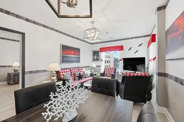 a living room with furniture fireplace and flat screen tv