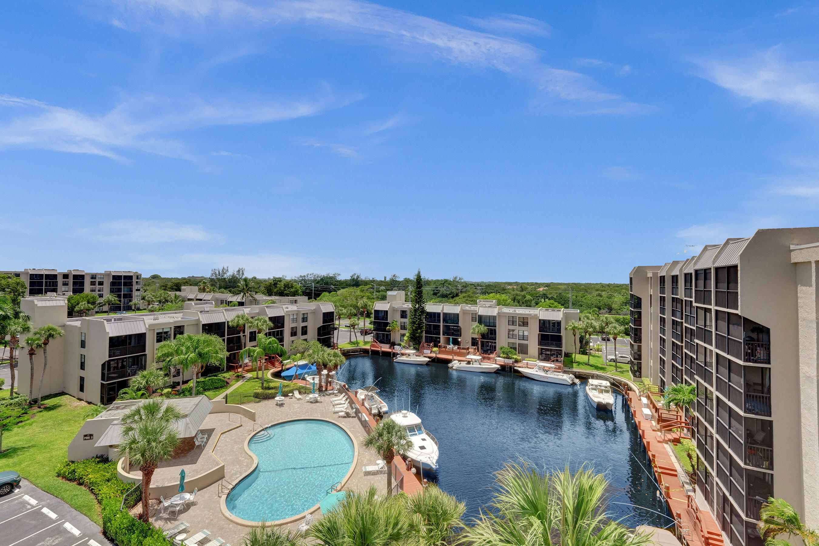 12 Royal Palm Way, Unit 6020 Boca Raton, FL 33432 - Photo 1 of 69 a view of a swimming pool patio and fire pit