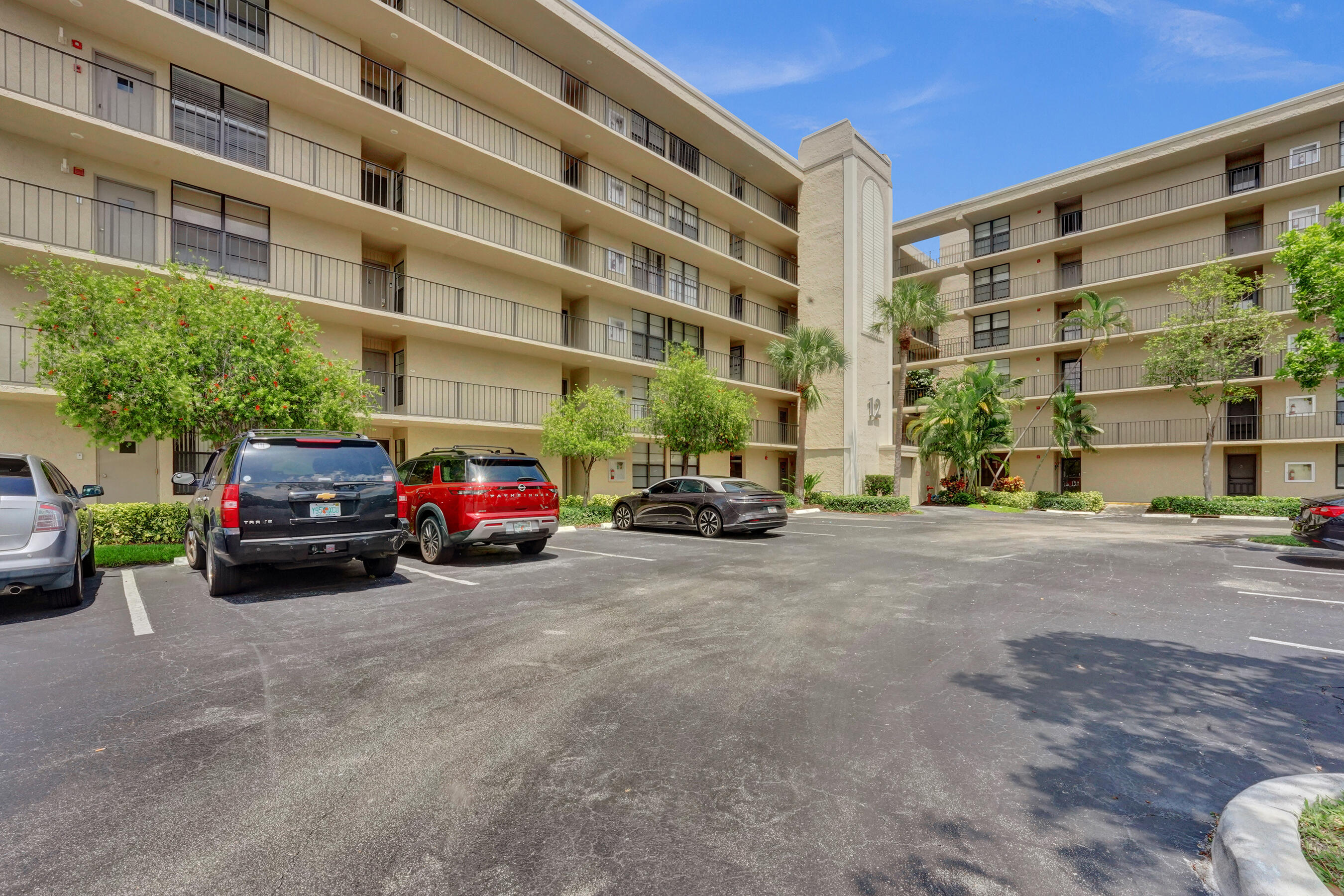 12 Royal Palm Way, Unit 6020 Boca Raton, FL 33432 - Photo 27 of 69 a car parked in front of a building