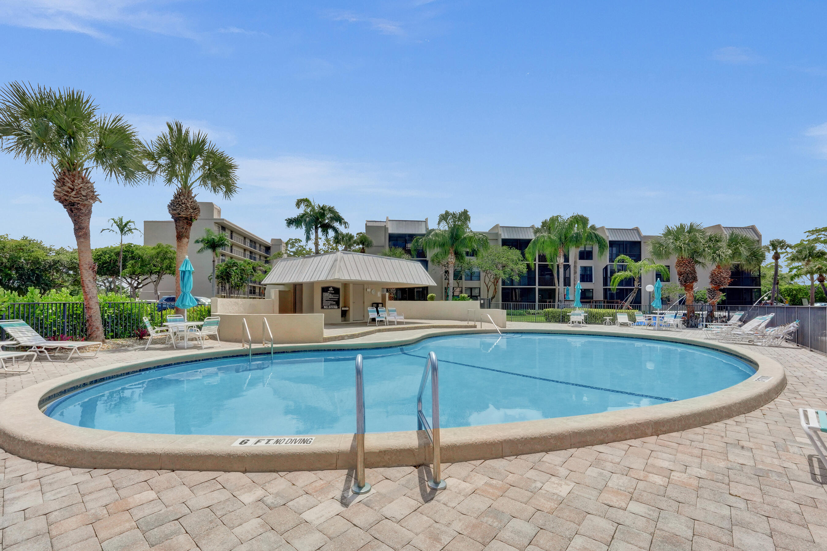 12 Royal Palm Way, Unit 6020 Boca Raton, FL 33432 - Photo 41 of 69 a view of a swimming pool with a patio