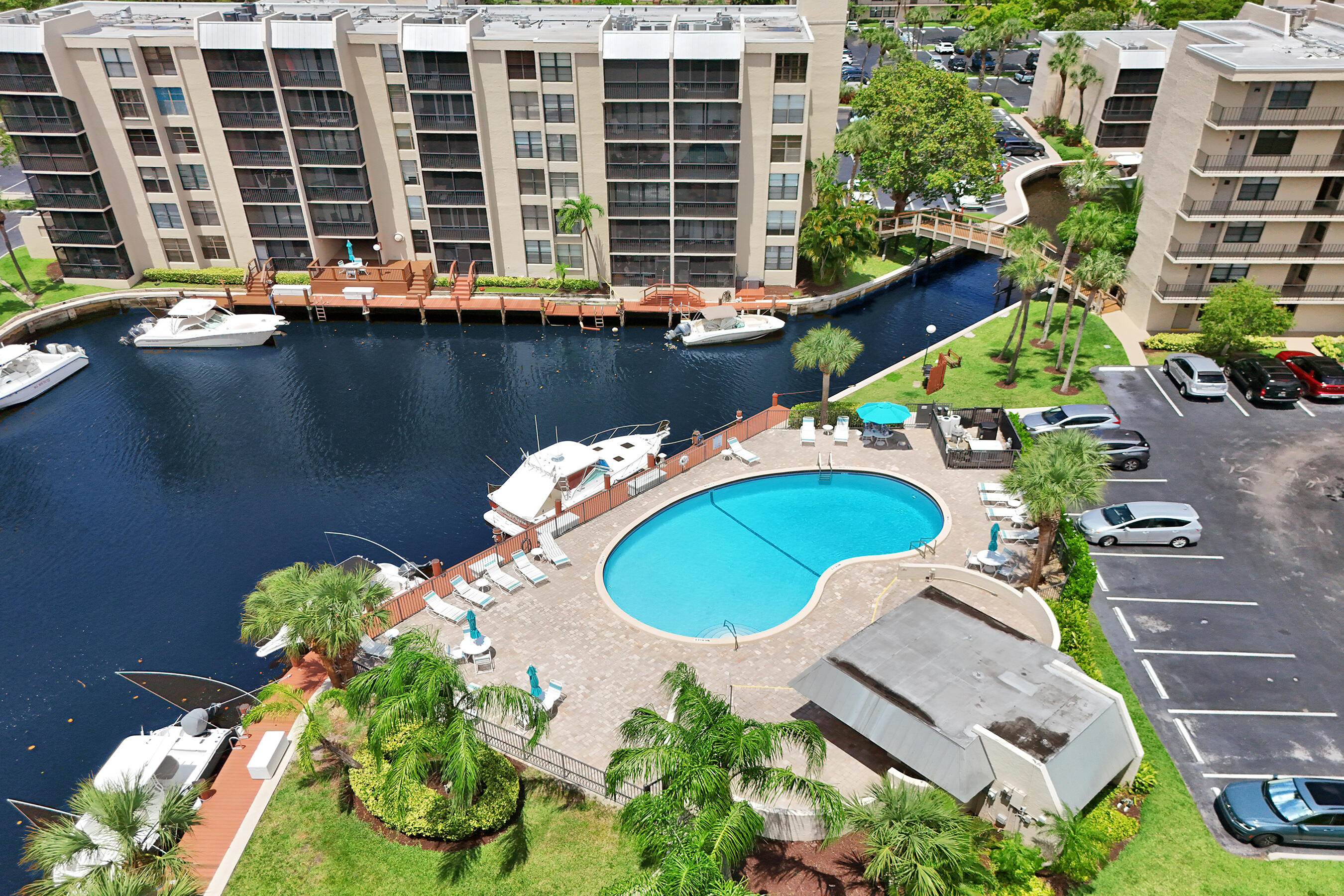 12 Royal Palm Way, Unit 6020 Boca Raton, FL 33432 - Photo 44 of 69 an aerial view of a house with a swimming pool and outdoor seating