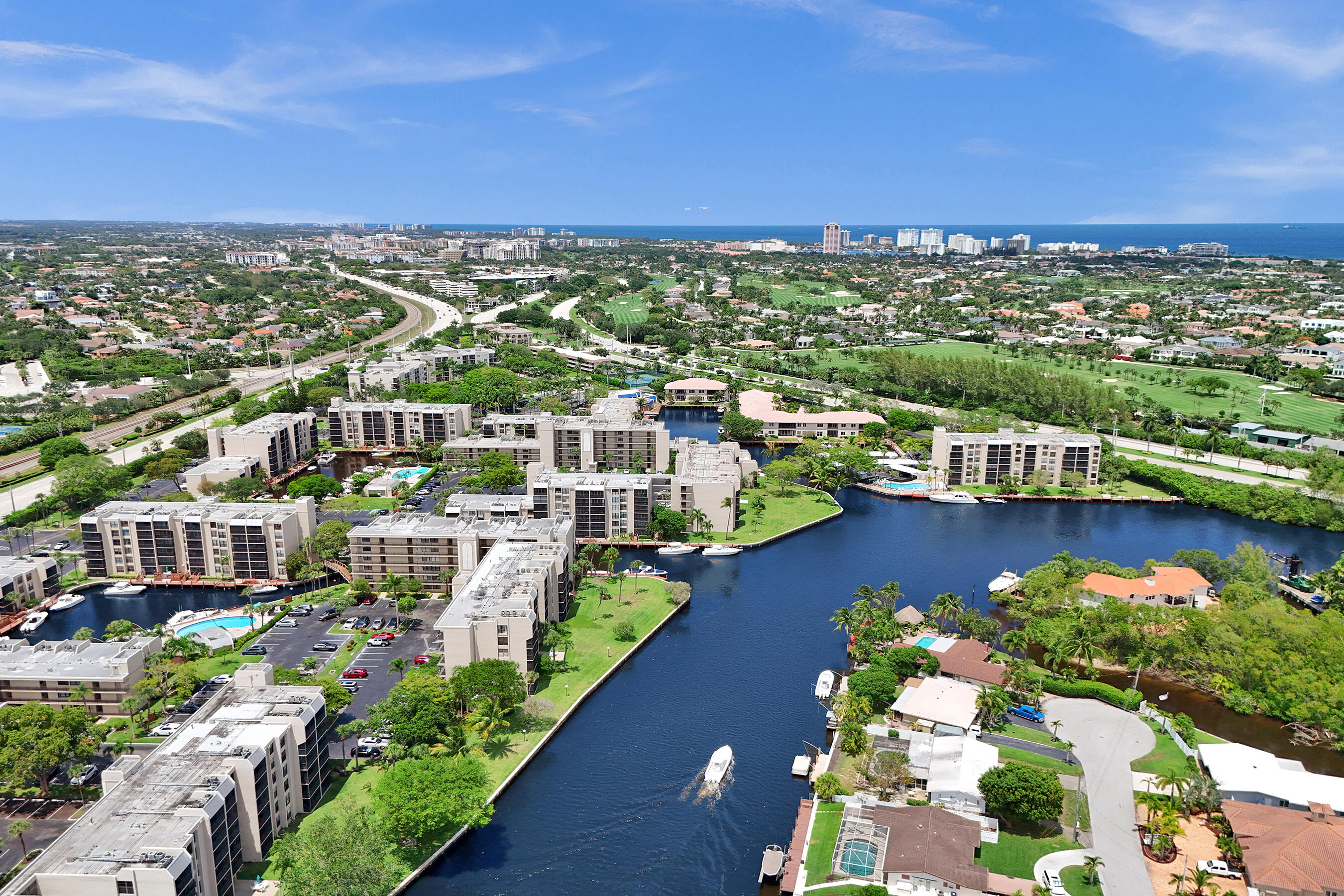 12 Royal Palm Way, Unit 6020 Boca Raton, FL 33432 - Photo 54 of 69 an aerial view of a city with lots of residential buildings ocean and mountain view in back
