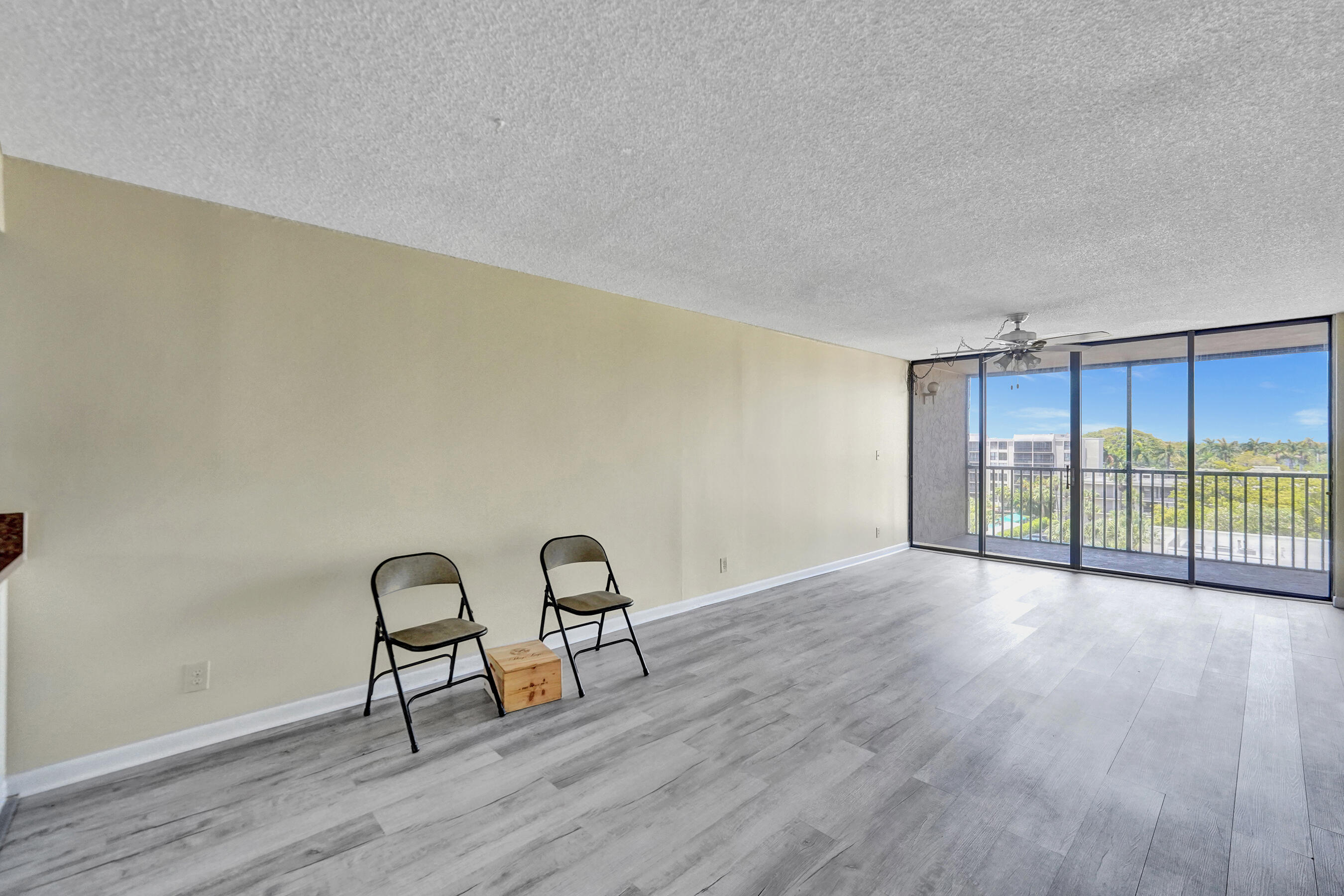 12 Royal Palm Way, Unit 6020 Boca Raton, FL 33432 - Photo 63 of 69 a view of a livingroom with wooden floor and furniture