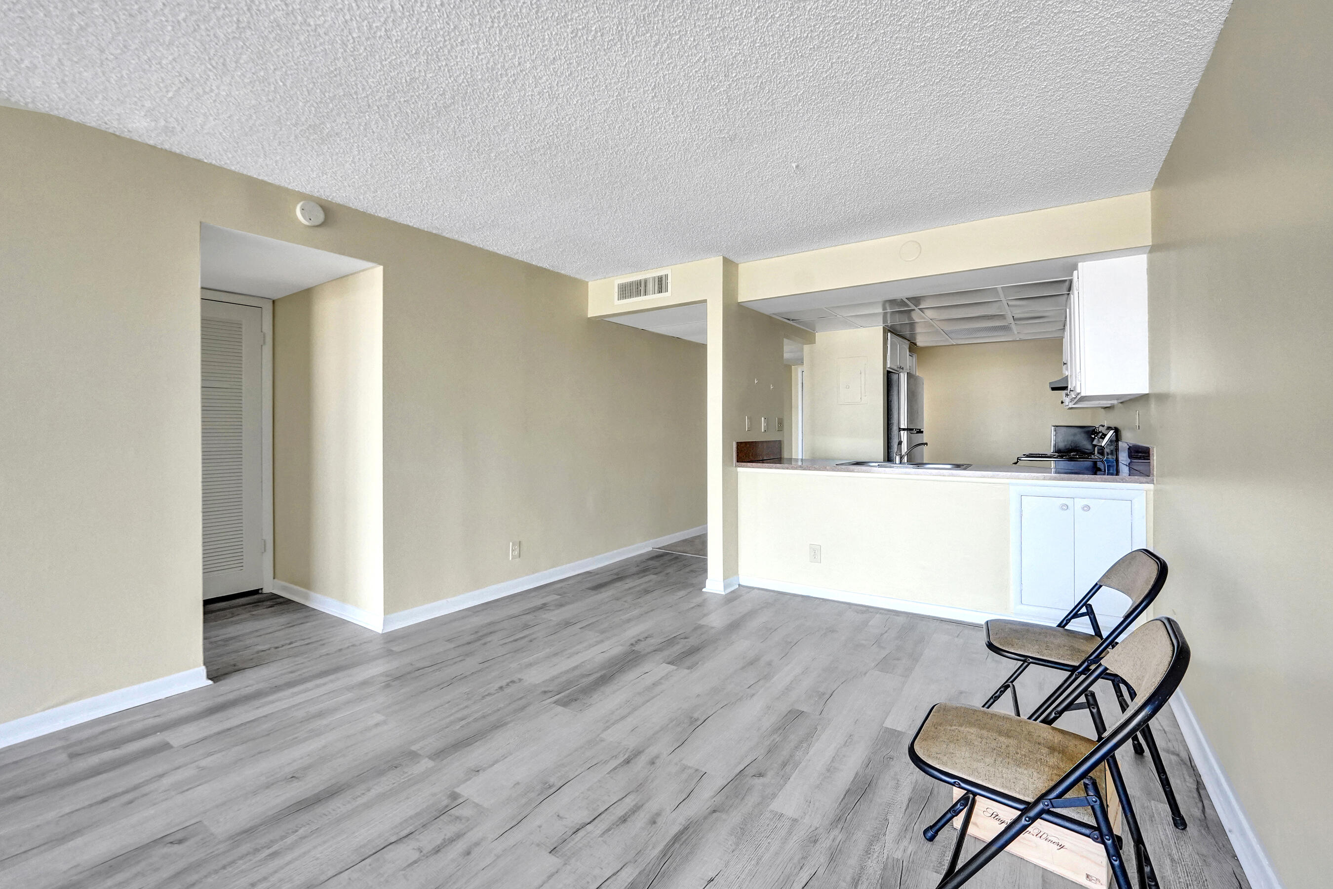 12 Royal Palm Way, Unit 6020 Boca Raton, FL 33432 - Photo 9 of 69 a living room with furniture and a wooden floor