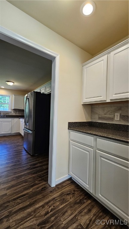 1290 Schutt Road Crewe, VA 23930 - Photo 19 of 50 a kitchen with granite countertop a refrigerator and a stove top oven