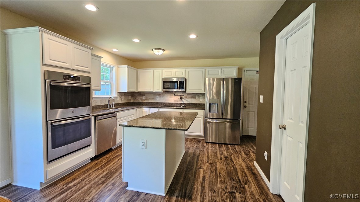 1290 Schutt Road Crewe, VA 23930 - Photo 20 of 50 a kitchen with a sink stove and refrigerator