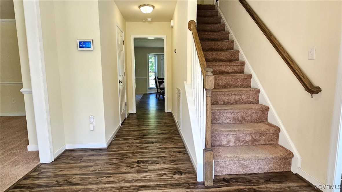 1290 Schutt Road Crewe, VA 23930 - Photo 31 of 50 a view of a hallway with wooden floor and entryway