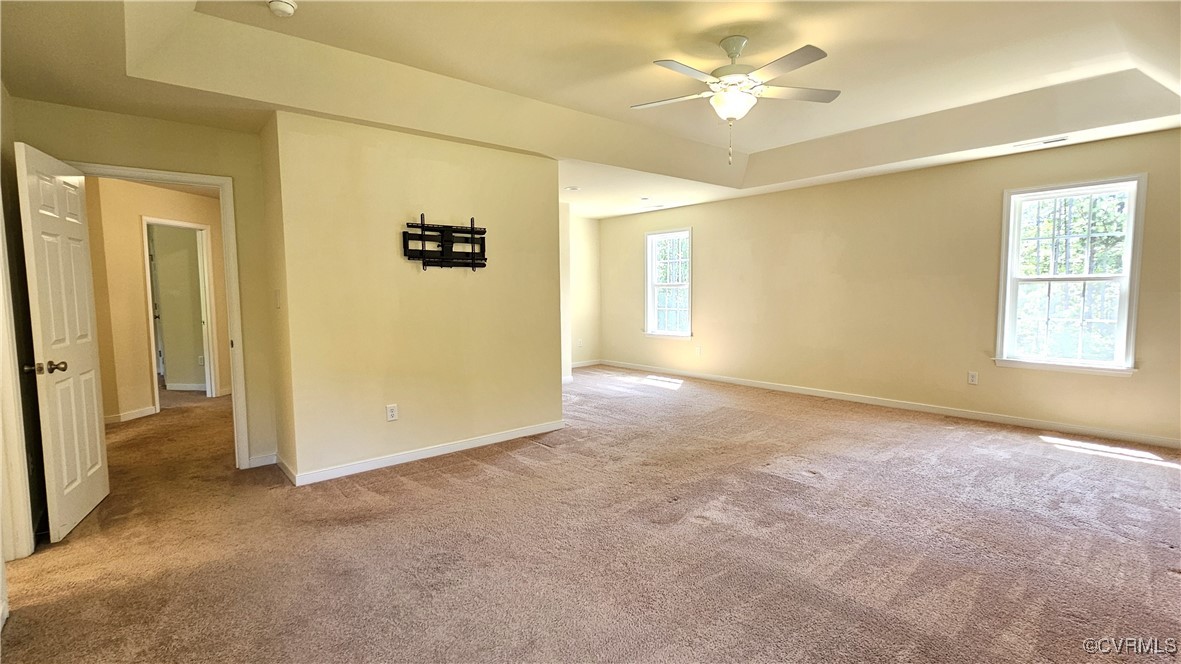 1290 Schutt Road Crewe, VA 23930 - Photo 34 of 50 an empty room with a ceiling fan and a window