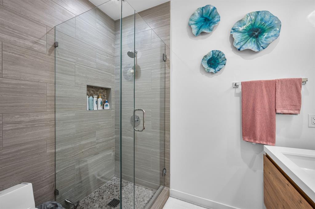 2214 Allen Street, Unit A Dallas, TX 75204 - Photo 11 of 36 a bathroom with a shower
