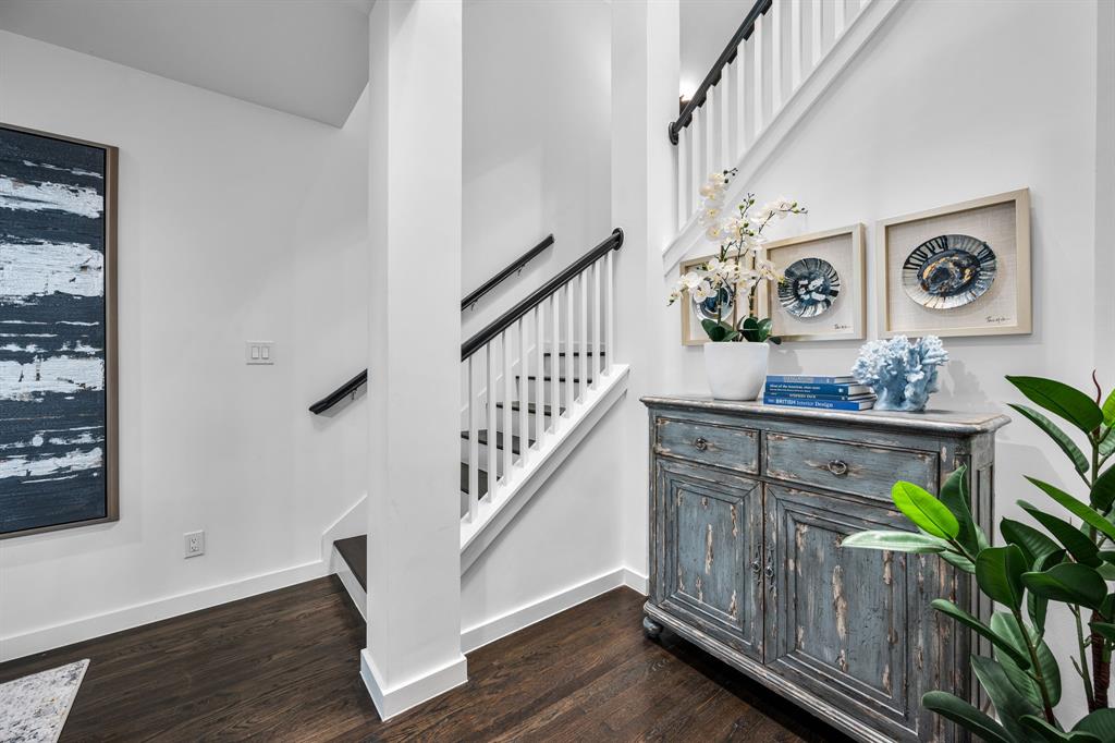 2214 Allen Street, Unit A Dallas, TX 75204 - Photo 14 of 36 a view of entryway with stairs and wooden floor