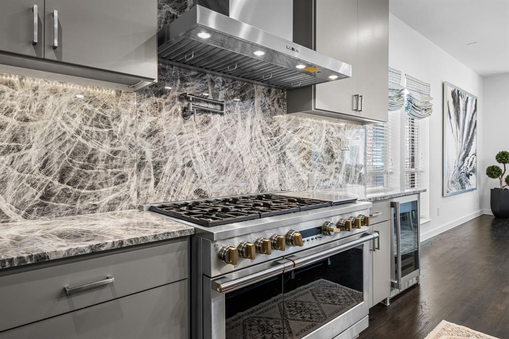 2214 Allen Street, Unit A Dallas, TX 75204 - Photo 21 of 36 a stove top oven sitting inside of a kitchen
